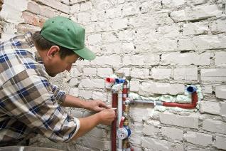 Contractor at work White Settlement Plumbing Contractor installs outdoor plumbing