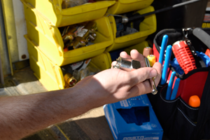 fort worth plumber grabs tools from the truck